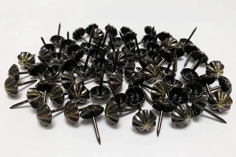 Premium 7/16 Inch Upholstery Tacks For Furniture Fix Ups, Slick Decorative Nailheads For Easy Diy Home Makeovers, Snug Fit Electroplated Fasteners That Are Damn Good To Work With, 100 Pack pile of matte black decorative upholstery tacks