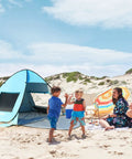 Family enjoying beach with UPF 50+ Pop Up Beach Tent Auto Sun Shelter for 2 to 3 People, kids playing, colorful umbrella in background
