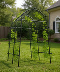 7.5 Ft Metal Garden Arch Trellis with netting in a garden setting, perfect for climbing roses, grapes, beans, and vegetables.