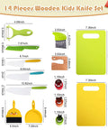 Front view of 14-piece wooden kids knife set with cutting board; green and yellow utensils, Amazon brand.