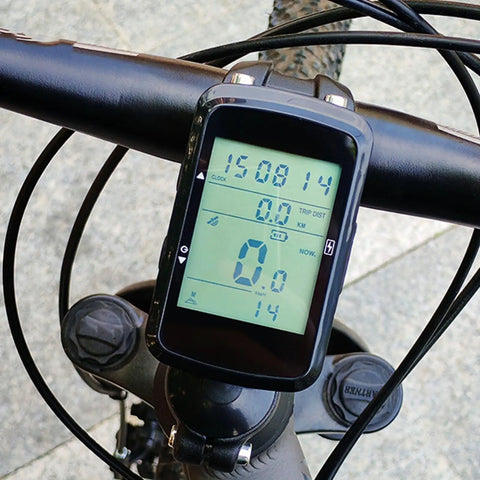 GPS Bike Computer With 2.4 Inch Screen And 28 Hour Battery Life For Mountain And Road Cycling, displaying data on handlebars.