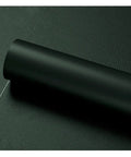 Rolled black self adhesive leather tape for car seats and furniture repair, strong hold, waterproof PU material on textured surface.
