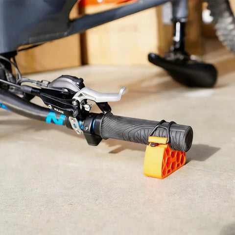 Two Pack Bike Handlebar Stand Portable Repair Stand For Bicycles And EBikes Anti Tip Parking Support Orange in use on handlebar