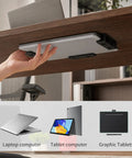 Hand placing laptop on Rock Solid Under Desk Laptop Mount Built Tough Adjustable Metal Shelf, perfect for tablets and keyboards.