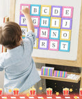 Awesome 100 Piece Magnetic Tiles Set For Kids Magnetic Blocks STEM Toy For Ages 3 To 8 Build Cars Castles And More Hands On Learning With Colorful Macaron Blocks Ideal Gift For Boys And Girls. Child placing alphabet magnetic tiles on easel