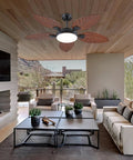 52 Inch Brown Tropical Outdoor Palm Leaf Ceiling Fan With Integrated Lights And Wireless Remote For Patio installed in a stylish covered outdoor space.