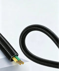 Premium Grade Built Tough Flexible Corrugated Conduit For Top Tier Cable Protection And Wire Management That Bends Like Butter Without Any Drama On Every Job Site, showing black corrugated tube with wires.