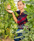 Gardener with Heavy Duty Trellis Netting 5 X 350 Feet White Polyester Garden Workhorse Support, growing tomatoes.