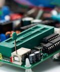 Close-up of a Universal ZIF IC Test Socket 14 Pin 2.54mm Pitch on a PCB with components, highlighting rock solid build.
