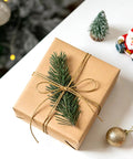 Gift wrapped with Decorative Metallic Bakers String Gold Twine 110 Yards 1.5mm Inelastic Glitter String for Christmas presents.