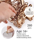 Hand assembling Wooden Marble Run Dragon Kit with gears, 260 components. DIY craft for adults 14+, STEM project for home.