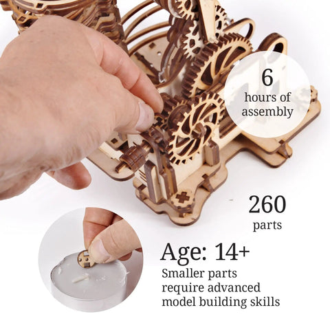 Hand assembling Wooden Marble Run Dragon Kit with gears, 260 components. DIY craft for adults 14+, STEM project for home.