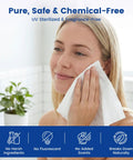 Woman using 200 Count Cotton Compressed Towels Pack Disposable Face Towels Portable Expandable Wipes For Travel Camping Hiking Outdoor Hotel Gym Bag Individually Wrapped And Travel Friendly