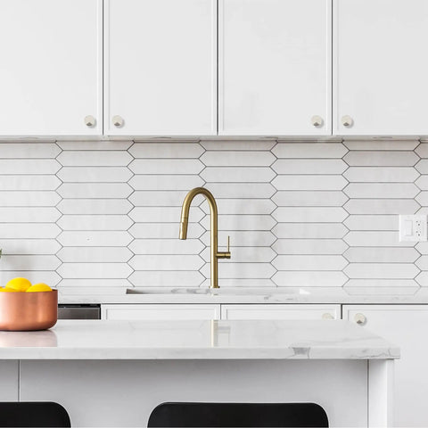 Brushed Nickel Round Cabinet Knobs Featuring Solid Zinc Construction And Easy Grip Design on modern kitchen cabinets.