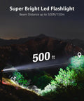 Ultra Bright LED Flashlight With Clip illuminating trees at night with a beam distance of 500 feet, perfect for camping.