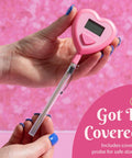 Person holding Heart Shaped Digital Thermometer For Cooking And Grilling With Instant Read In Celsius Or Fahrenheit Pink Finish