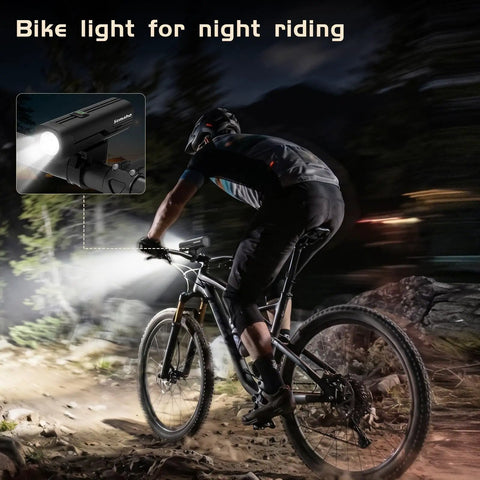 Cyclist using 400 Lumen Rechargeable Bike Headlight For Night Riding With IP66 Waterproof Front Light on mountain trail