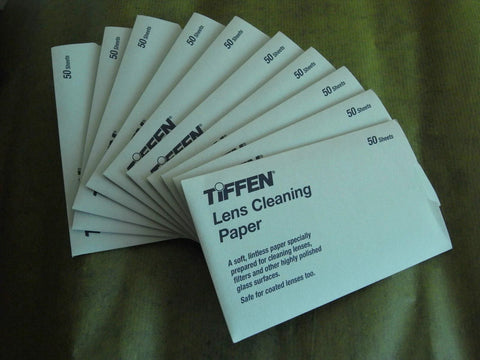 Front view of TIFFEN Lens Cleaning Paper packs, white, 50 sheets each, fanned display