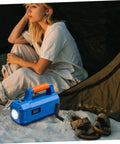 Upgrade Your Setup With This Super Cool Unomor Plastic Hand Crank Handle Replacement Featuring A Sweet 10mm Round Hole For Milling Machines Work Benches And Camping Gear Ergonomic Grip Makes It Easy Peasy To Use Lightweight Durable Design Ensures Long, blue manual crank light next to a camper on a sandy beach at dusk.