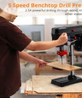 Solid Shop Ready Benchtop Drill Press With Eight Inch Chuck And Boss Two Point Five Amp Motor Serving Up Five Swift Speed Ranges Plus Smooth Tilting Table For Quick Wood Metal Projects in workshop, drilling wood.