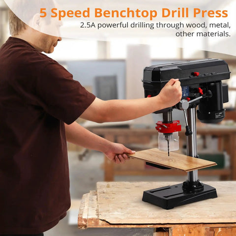 Solid Shop Ready Benchtop Drill Press With Eight Inch Chuck And Boss Two Point Five Amp Motor Serving Up Five Swift Speed Ranges Plus Smooth Tilting Table For Quick Wood Metal Projects in workshop, drilling wood.