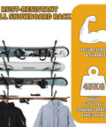4 Board Snowboard Wall Rack Adjustable Storage for Ski Surfboard Wakeboard Wall Mount Display with Accessory Hooks to Hang Backpacks and Jackets Keep Your Shred Quiver Tidy in the Garage or Living Room Space Saver Black with displayed boards and jackets.
