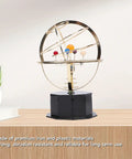 Gold Tone Solar System Model Decoration With Iron And Plastic Grand Orrery on a desk for educational use