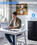 Straight Up Game Changer 3.2 Cubic Foot Mini Fridge With Separate Freezer in a home office setup, quiet operation, sleek black design.