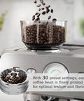 Top Shelf Espresso Machine With Built In Grinder And 20 Bar Pressure sleek glass bowl with coffee beans on brushed silver finish.
