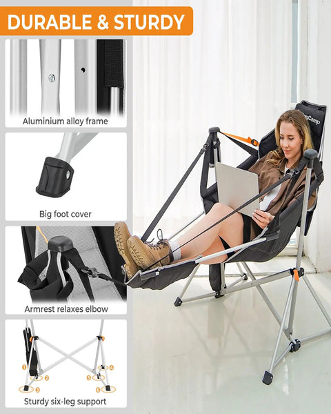 Woman relaxing in a heavy-duty hammock chair with footrest for 400 lbs, reading on a laptop, durable aluminum alloy frame.