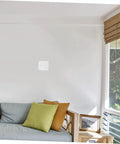 Living room wall with installed 12 Pack Self-Adhesive Wall Repair Patches For Drywall - Fiberglass Mesh Kit For Quick Damage Repairs