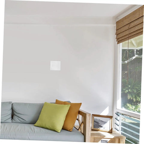 Living room wall with installed 12 Pack Self-Adhesive Wall Repair Patches For Drywall - Fiberglass Mesh Kit For Quick Damage Repairs