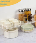 Clear Acrylic Cabinet Organizer And Kitchen Countertop Spice Rack Slick Multi Tier Shelf Riser with jars and dishes.