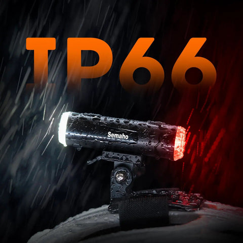 All In One 2 In 1 Rechargeable Helmet Light With Bracket Mount Front And Rear Bike Light shown in rain to highlight IP66 waterproofing