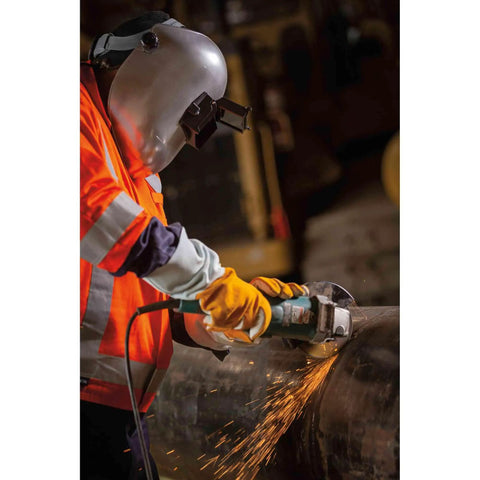 Worker using PL280 Pipeline Welding Helmet Shade 10 Flip Front Hood Built For Tight Spots ANSI Z87.1 Made In USA
