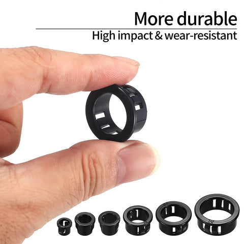 Hand holding one black grommet from 170 Pcs Black Round Nylon Cable Snap Grommets Set Durable PA66 Material Snap In Grommet Protectors Assorted Sizes