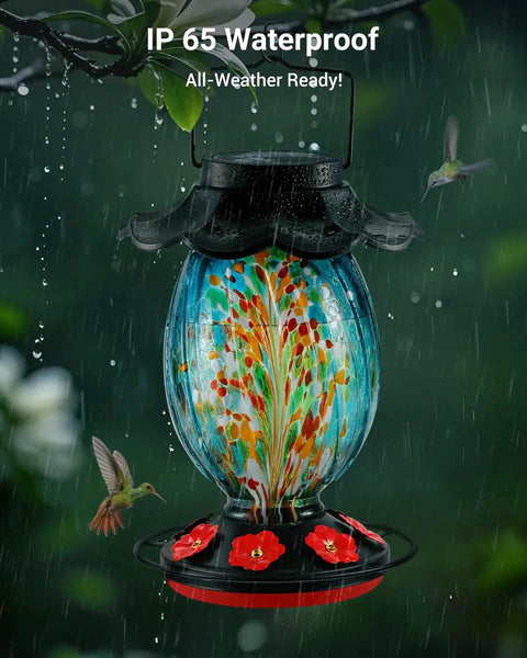 Solar Powered Hummingbird Feeder With 49 Fl Oz Capacity Hand Blown Blue Glass Color Changing Night Glow Seven Feeding Ports With Perch Never Leaks Outdoor Hanging For Your Yard