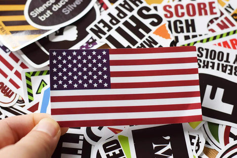 Blue Collar Humor 100 Pack Waterproof Hard Hat Stickers featuring an American flag among funny and sarcastic decals.