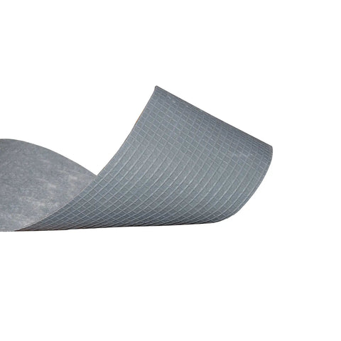 Close-up of Rug Traction Tape Anti Slip Rubber Backing For Carpets And Mats, showing adhesive backing and grid texture design.