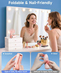 Woman using Portable Handheld Mini Fan With LED Display among makeup on vanity