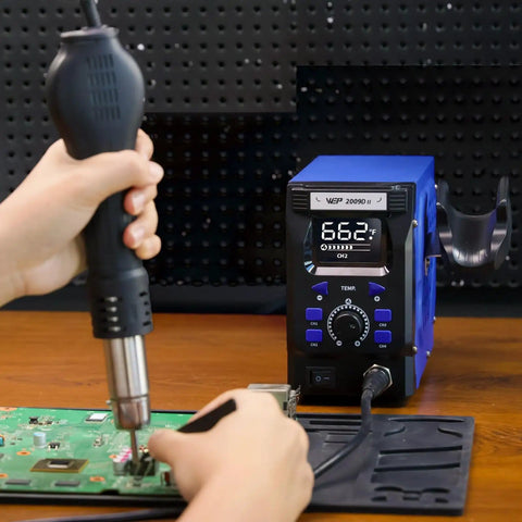 Pro Grade Hot Air Rework Station with Detachable Soldering Gun and Digital LED Display in use on circuit board