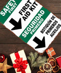 Funny First Aid Kit Metal Sign 8x12 Aluminum Wall Decor against wood table with holiday decorations