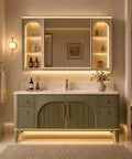Slick Modern Freestanding Bathroom Vanity In Muted Sage With Frosted Led Mirror Cabinet And Warm Gold Trim showcasing organized storage and lighting.