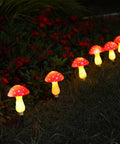 Colorful Solar Mushroom String Lights Waterproof Outdoor Decor With 8 Modes And Memory For Garden Pathway Landscape Yard Easter Halloween Xmas Holiday Vibe Decor Set Of 6 Red illuminating at night.