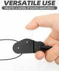 Outrigger Halyard Lock Pulley With Ball Bearing Snap Swivel For Offshore Fishing Beefed Up Line Lock System To Keep Your Halyard In Check Improved Trolling Control Black Edition black pulley held by hand