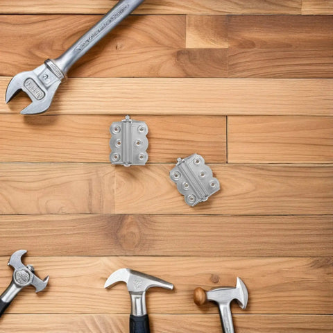 Self Closing Stainless Steel Spring Door Hinges With Screws on wooden surface with tools