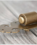 Tough As Nails Heavy Duty Solid Brass Slide Door Bolt Lock With Concealed Screw Surface Mount Hardware, close-up view of latch mechanism.