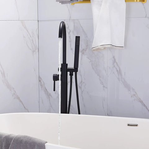 Matte Black Freestanding Tub Faucet Floor Mounted Brass Bathroom Tub Filler With Hand Shower Sleek Dope Style in a modern bathroom