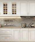 White kitchen cabinets with 50 Pack Brushed Brass Cabinet Pulls 3 3/4 Inch Long, Satin Gold Kitchen Drawer Handles installed.