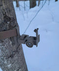 Versatile Trail Camera Mount For Moultrie Edge Models 2 And 3 Solar attached to tree using strap, side view